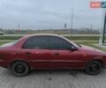 Красный Дэу Ланос, объемом двигателя 1.5 л и пробегом 275 тыс. км за 1700 $, фото 1 на Automoto.ua