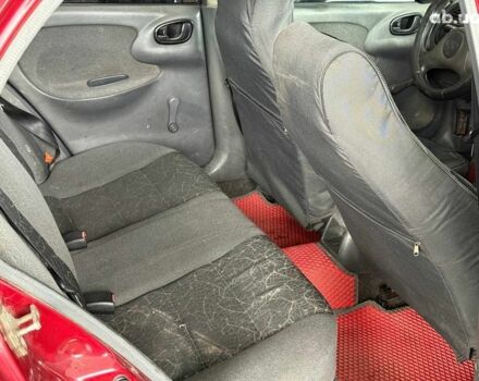 Красный Дэу Ланос, объемом двигателя 1.5 л и пробегом 305 тыс. км за 2440 $, фото 12 на Automoto.ua