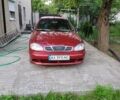 Красный Дэу Ланос, объемом двигателя 1.6 л и пробегом 220 тыс. км за 2800 $, фото 1 на Automoto.ua