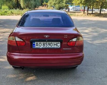 Красный Дэу Ланос, объемом двигателя 1.5 л и пробегом 159 тыс. км за 2900 $, фото 3 на Automoto.ua