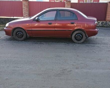 Красный Дэу Ланос, объемом двигателя 1.5 л и пробегом 157 тыс. км за 2750 $, фото 1 на Automoto.ua