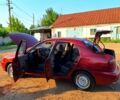 Красный Дэу Ланос, объемом двигателя 1.5 л и пробегом 220 тыс. км за 2200 $, фото 7 на Automoto.ua