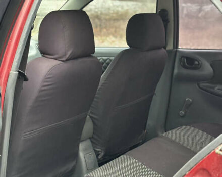 Красный Дэу Ланос, объемом двигателя 1.6 л и пробегом 235 тыс. км за 2150 $, фото 9 на Automoto.ua