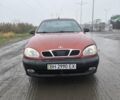 Красный Дэу Ланос, объемом двигателя 1.5 л и пробегом 305 тыс. км за 1800 $, фото 1 на Automoto.ua