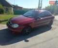 Красный Дэу Ланос, объемом двигателя 1.5 л и пробегом 330 тыс. км за 2550 $, фото 1 на Automoto.ua