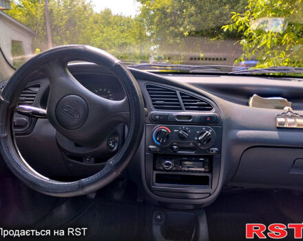 Красный Дэу Ланос, объемом двигателя 1.5 л и пробегом 132 тыс. км за 2390 $, фото 6 на Automoto.ua