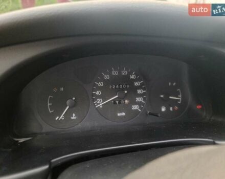 Червоний Деу Ланос, об'ємом двигуна 1.5 л та пробігом 224 тис. км за 1400 $, фото 2 на Automoto.ua