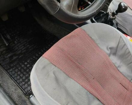 Красный Дэу Ланос, объемом двигателя 1.5 л и пробегом 275 тыс. км за 1700 $, фото 3 на Automoto.ua