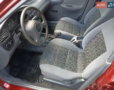 Красный Дэу Ланос, объемом двигателя 1.5 л и пробегом 174 тыс. км за 2650 $, фото 12 на Automoto.ua