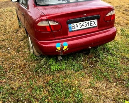 Красный Дэу Ланос, объемом двигателя 1.5 л и пробегом 200 тыс. км за 900 $, фото 2 на Automoto.ua