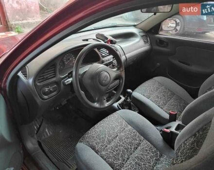 Красный Дэу Ланос, объемом двигателя 1.5 л и пробегом 322 тыс. км за 2550 $, фото 3 на Automoto.ua