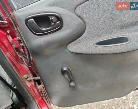 Красный Дэу Ланос, объемом двигателя 1.5 л и пробегом 275 тыс. км за 1700 $, фото 14 на Automoto.ua