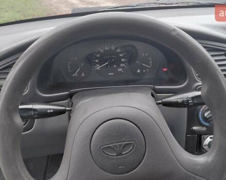 Красный Дэу Ланос, объемом двигателя 1.5 л и пробегом 230 тыс. км за 2600 $, фото 9 на Automoto.ua