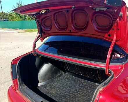 Червоний Деу Ланос, об'ємом двигуна 1.5 л та пробігом 313 тис. км за 2480 $, фото 1 на Automoto.ua