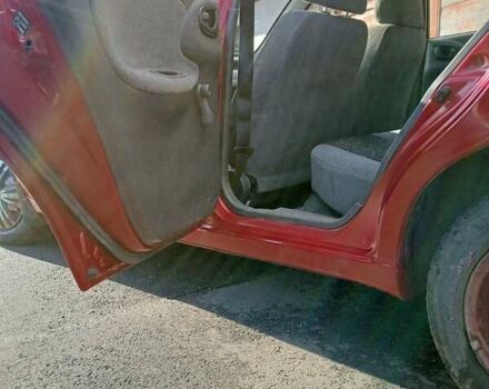 Червоний Деу Ланос, об'ємом двигуна 1.5 л та пробігом 268 тис. км за 1950 $, фото 12 на Automoto.ua