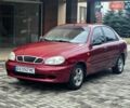 Красный Дэу Ланос, объемом двигателя 1.5 л и пробегом 84 тыс. км за 1800 $, фото 1 на Automoto.ua