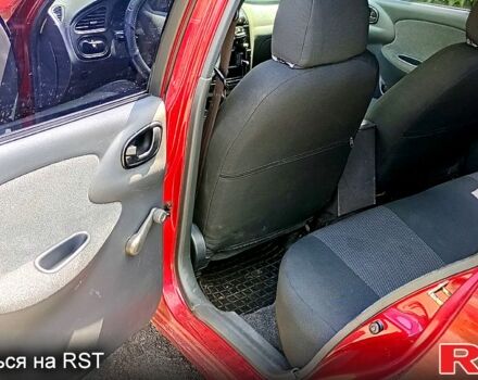 Червоний Деу Ланос, об'ємом двигуна 1.5 л та пробігом 350 тис. км за 1200 $, фото 4 на Automoto.ua