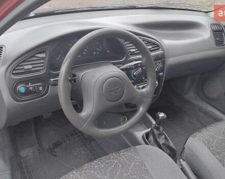 Красный Дэу Ланос, объемом двигателя 1.5 л и пробегом 230 тыс. км за 2600 $, фото 12 на Automoto.ua