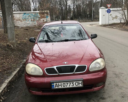 Красный Дэу Ланос, объемом двигателя 1.5 л и пробегом 200 тыс. км за 2000 $, фото 1 на Automoto.ua