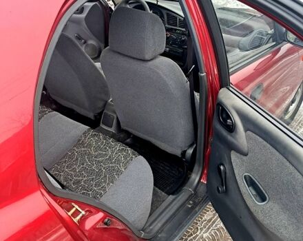 Красный Дэу Ланос, объемом двигателя 1.5 л и пробегом 220 тыс. км за 2100 $, фото 2 на Automoto.ua