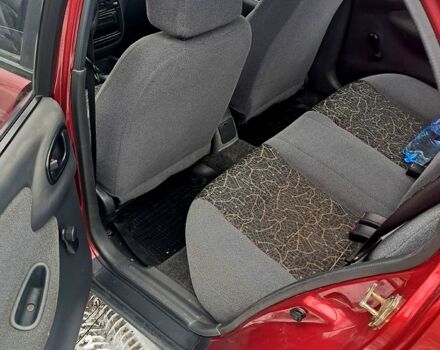 Красный Дэу Ланос, объемом двигателя 1.5 л и пробегом 220 тыс. км за 2100 $, фото 10 на Automoto.ua