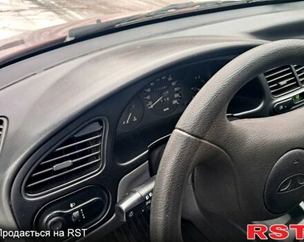 Красный Дэу Ланос, объемом двигателя 1.5 л и пробегом 220 тыс. км за 2100 $, фото 5 на Automoto.ua