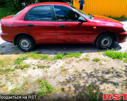 Красный Дэу Ланос, объемом двигателя 1.5 л и пробегом 132 тыс. км за 2390 $, фото 1 на Automoto.ua