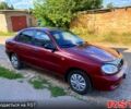 Красный Дэу Ланос, объемом двигателя 1.5 л и пробегом 239 тыс. км за 2250 $, фото 1 на Automoto.ua