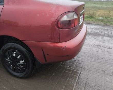 Красный Дэу Ланос, объемом двигателя 1.5 л и пробегом 305 тыс. км за 1800 $, фото 5 на Automoto.ua