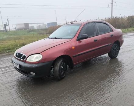 Красный Дэу Ланос, объемом двигателя 1.5 л и пробегом 305 тыс. км за 1800 $, фото 3 на Automoto.ua