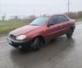 Красный Дэу Ланос, объемом двигателя 1.5 л и пробегом 305 тыс. км за 1800 $, фото 3 на Automoto.ua