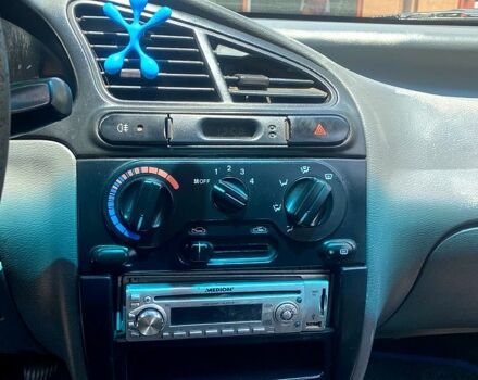 Красный Дэу Ланос, объемом двигателя 1.5 л и пробегом 0 тыс. км за 1000 $, фото 5 на Automoto.ua