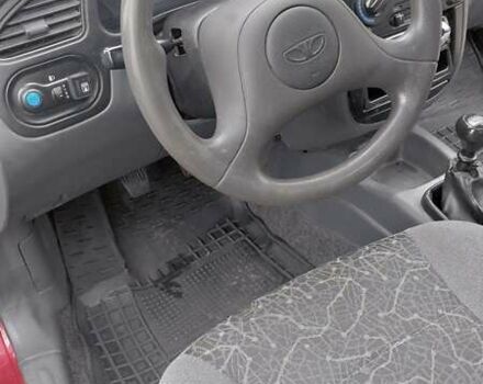 Красный Дэу Ланос, объемом двигателя 1.5 л и пробегом 230 тыс. км за 2600 $, фото 10 на Automoto.ua