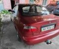 Красный Дэу Ланос, объемом двигателя 1.5 л и пробегом 322 тыс. км за 2550 $, фото 4 на Automoto.ua
