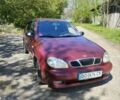 Красный Дэу Ланос, объемом двигателя 1.5 л и пробегом 311 тыс. км за 1800 $, фото 1 на Automoto.ua