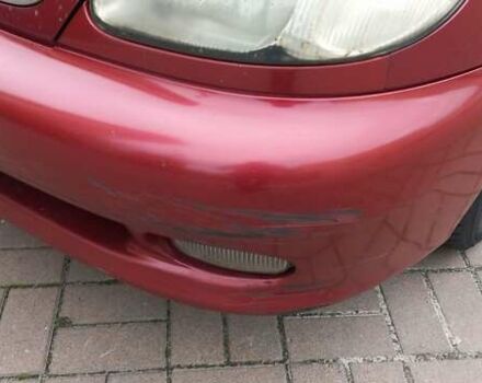 Червоний Деу Ланос, об'ємом двигуна 1.5 л та пробігом 286 тис. км за 1750 $, фото 12 на Automoto.ua