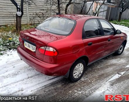 Красный Дэу Ланос, объемом двигателя 1.5 л и пробегом 220 тыс. км за 2100 $, фото 1 на Automoto.ua