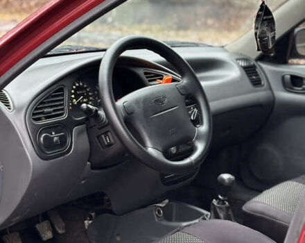 Красный Дэу Ланос, объемом двигателя 1.6 л и пробегом 235 тыс. км за 2150 $, фото 6 на Automoto.ua