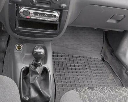 Красный Дэу Ланос, объемом двигателя 1.5 л и пробегом 230 тыс. км за 2600 $, фото 14 на Automoto.ua