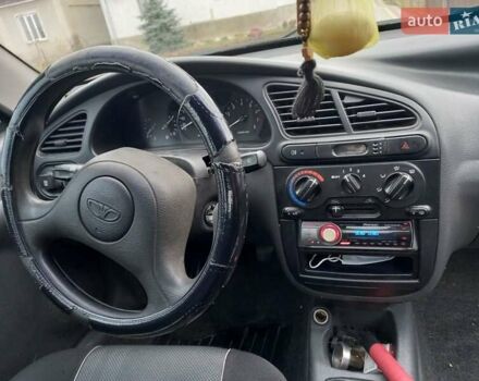 Красный Дэу Ланос, объемом двигателя 1.5 л и пробегом 153 тыс. км за 1300 $, фото 1 на Automoto.ua