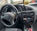 Красный Дэу Ланос, объемом двигателя 1.5 л и пробегом 153 тыс. км за 1300 $, фото 1 на Automoto.ua