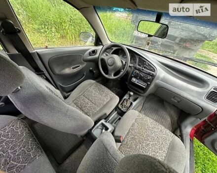 Красный Дэу Ланос, объемом двигателя 1.5 л и пробегом 150 тыс. км за 1250 $, фото 15 на Automoto.ua