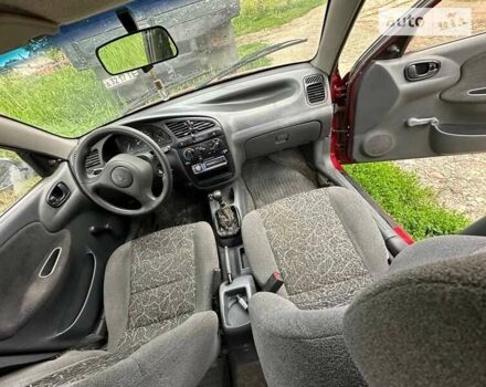 Красный Дэу Ланос, объемом двигателя 1.5 л и пробегом 150 тыс. км за 1250 $, фото 3 на Automoto.ua