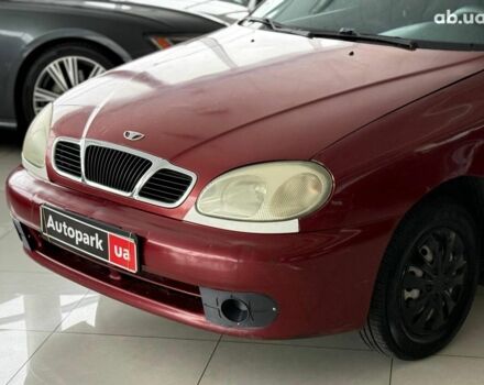 Красный Дэу Ланос, объемом двигателя 1.5 л и пробегом 305 тыс. км за 2440 $, фото 3 на Automoto.ua