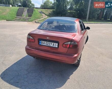 Красный Дэу Ланос, объемом двигателя 1.5 л и пробегом 270 тыс. км за 2100 $, фото 5 на Automoto.ua