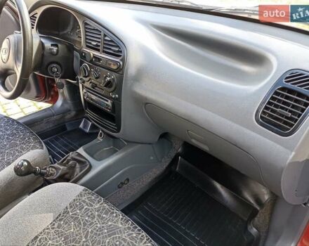 Красный Дэу Ланос, объемом двигателя 1.5 л и пробегом 174 тыс. км за 2650 $, фото 15 на Automoto.ua
