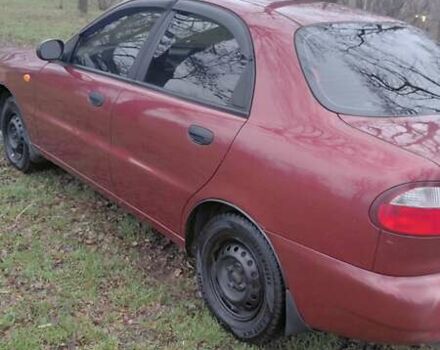 Красный Дэу Ланос, объемом двигателя 1.5 л и пробегом 230 тыс. км за 2600 $, фото 3 на Automoto.ua