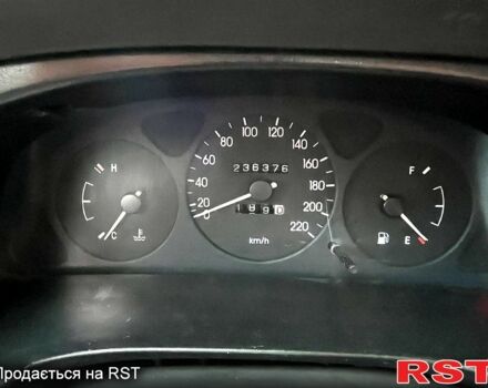 Красный Дэу Ланос, объемом двигателя 1.5 л и пробегом 230 тыс. км за 2300 $, фото 2 на Automoto.ua