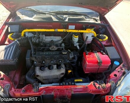 Червоний Деу Ланос, об'ємом двигуна 1.5 л та пробігом 313 тис. км за 2480 $, фото 2 на Automoto.ua