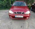 Червоний Деу Ланос, об'ємом двигуна 1.6 л та пробігом 221 тис. км за 1750 $, фото 1 на Automoto.ua